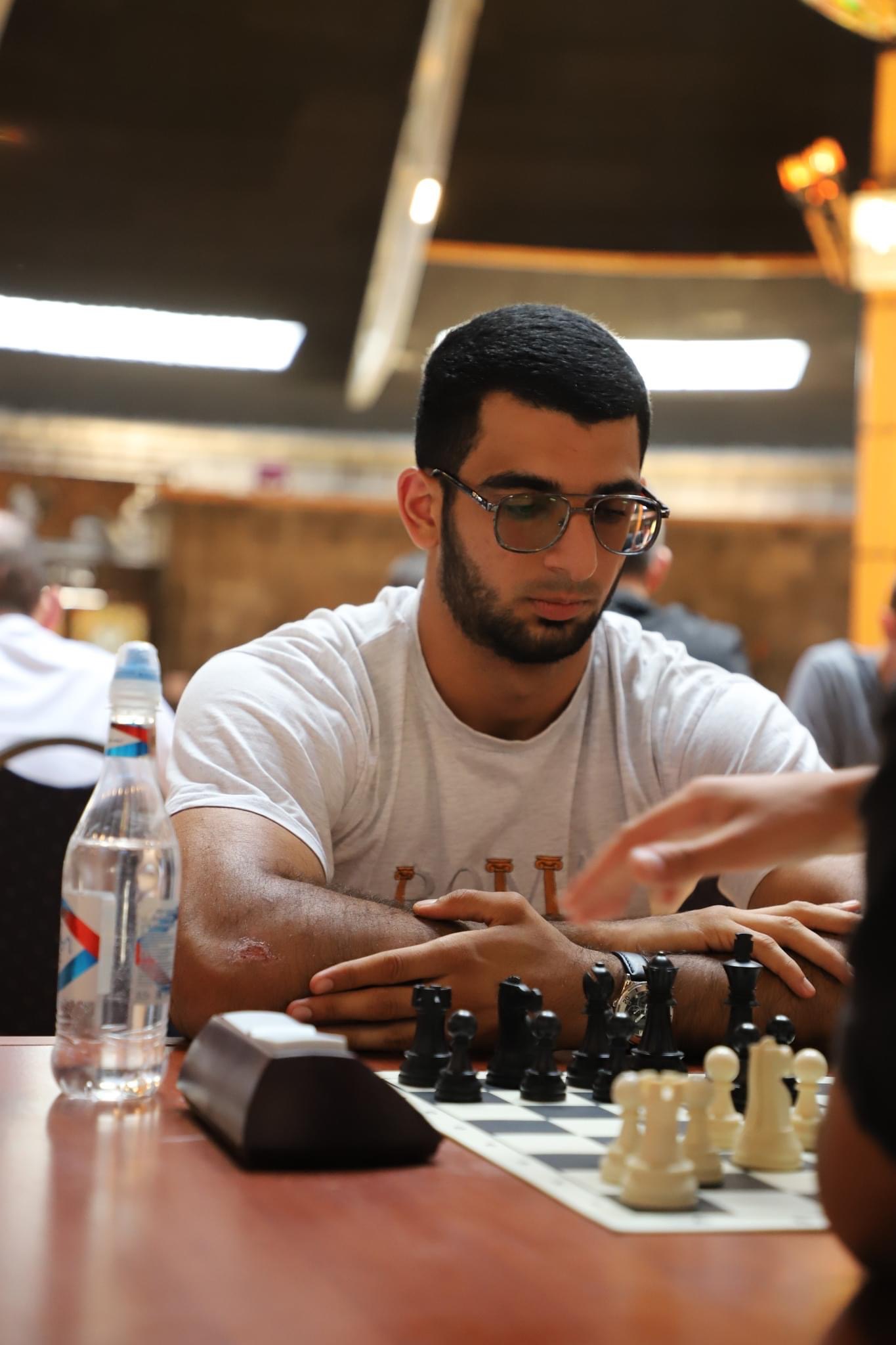 Ara Yeroyan playing at a chess tournament