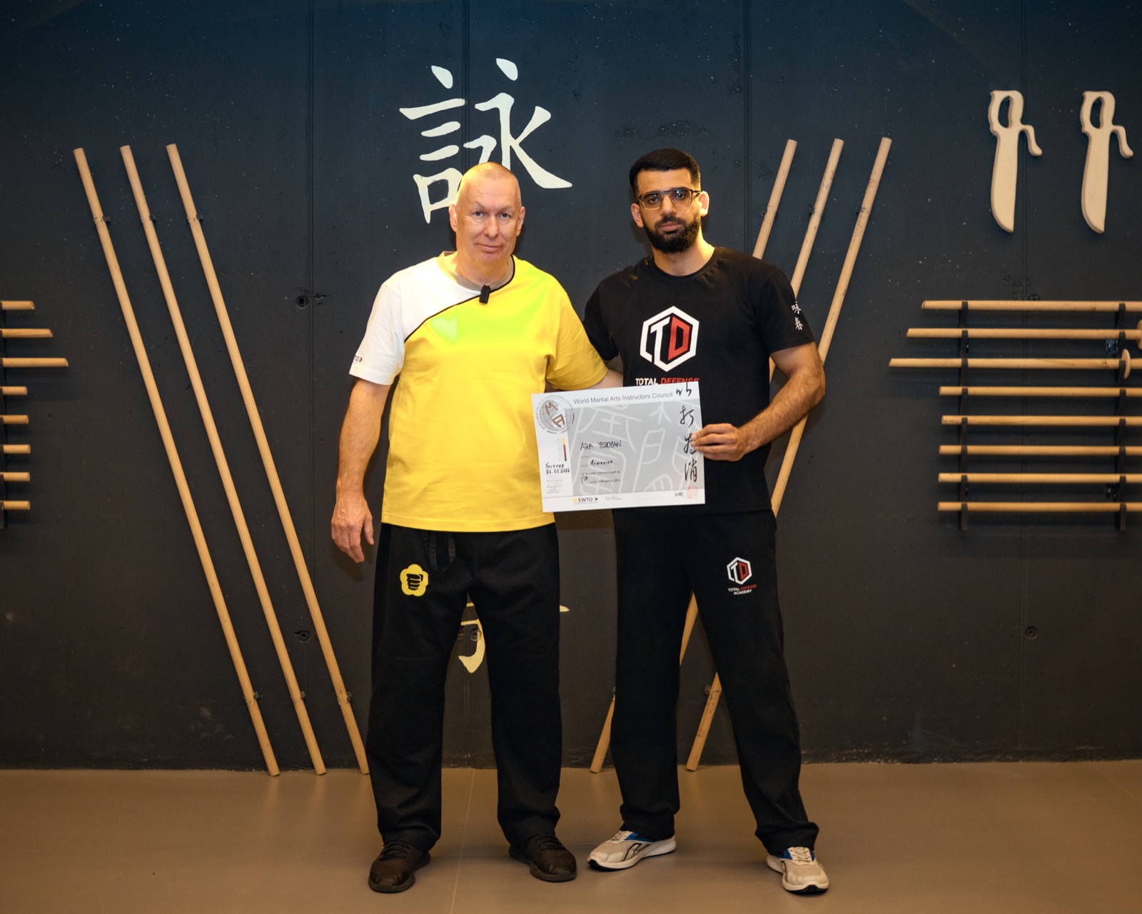 Ara Yeroyan receiving his EWTO Wing Tsun instructor licence